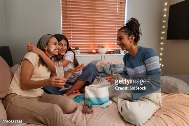 mother and daughters bonding night - girlie room stock pictures, royalty-free photos & images