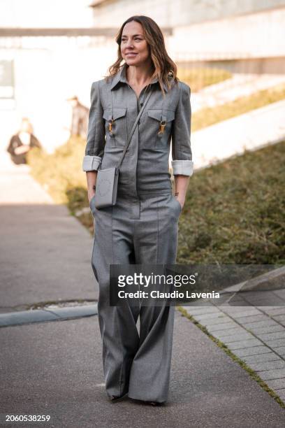 Melanie Jayne Chisholm wears grey jumpsuit, grey Stella McCartney crossbody bag, outside Stella McCartney, during the Womenswear Fall/Winter...