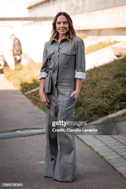 Melanie Jayne Chisholm wears grey jumpsuit, grey Stella McCartney crossbody bag, outside Stella McCartney, during the Womenswear Fall/Winter...