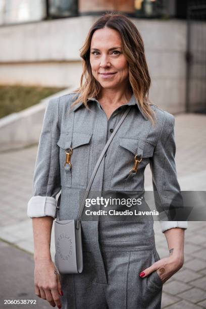 Melanie Jayne Chisholm wears grey jumpsuit, grey Stella McCartney crossbody bag, outside Stella McCartney, during the Womenswear Fall/Winter...