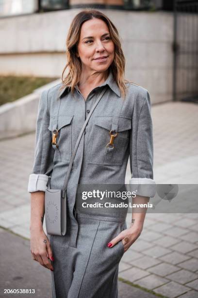 Melanie Jayne Chisholm wears grey jumpsuit, grey Stella McCartney crossbody bag, outside Stella McCartney, during the Womenswear Fall/Winter...