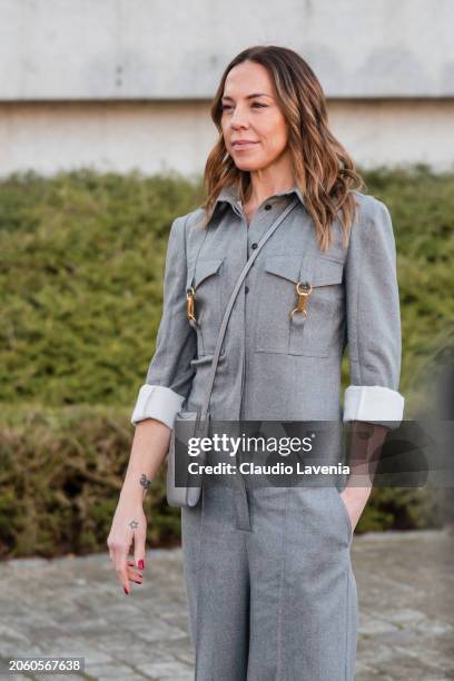 Melanie Jayne Chisholm wears grey jumpsuit, grey Stella McCartney crossbody bag, outside Stella McCartney, during the Womenswear Fall/Winter...