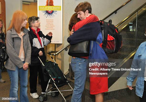 Kathryn Busse, of Cooperstown, welcomes her son Derek Busse, age 21, as he arrives at the Albany International Airport in Colonie, NY on November 24,...