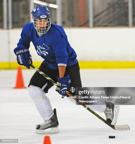 Saratoga hockey player Cody Nizolek runs a drill during practice at the Saratoga Springs Hockey Rink in Saratoga Springs, NY on December 21, 2009.