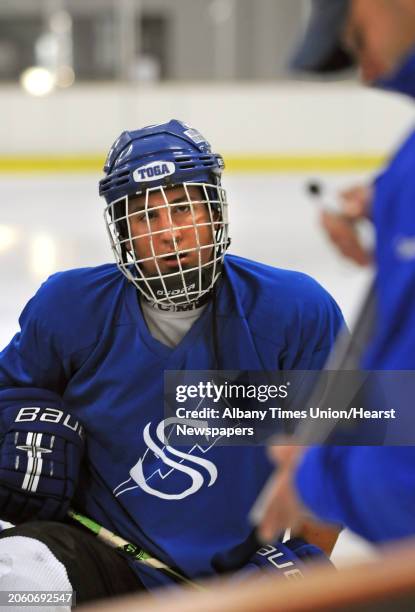 Saratoga hockey player Cody Nizolek listens to the coach explain the next drill during practice at the Saratoga Springs Hockey Rink in Saratoga...