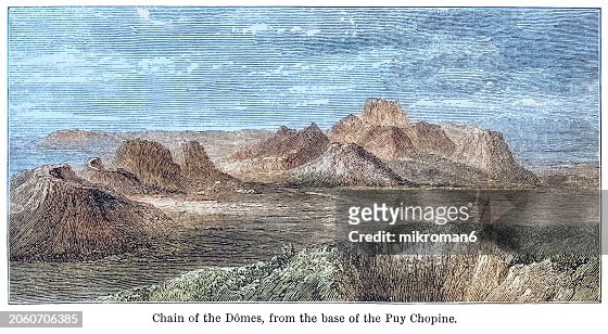 Old engraving illustration of the Chaîne des Puys, a north-south oriented chain of cinder cones, lava domes, and maars in the Massif Central of France (highest point is the lava dome of Puy de Dôme, located near the middle of the chain, which is 1,465 m)