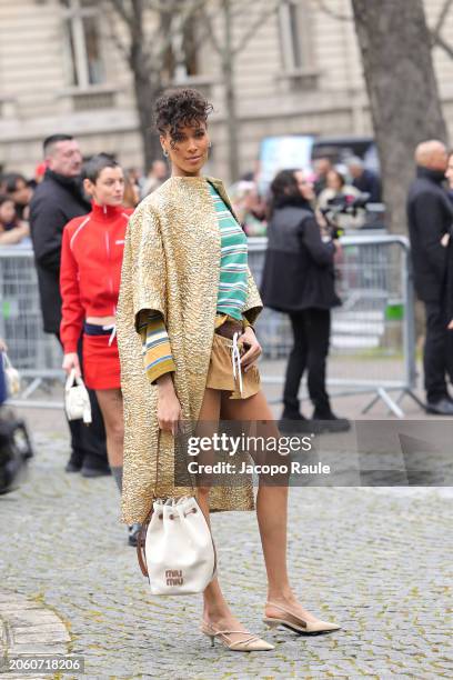 Cindy Bruna attends the Miu Miu Womenswear Fall/Winter 2024-2025 show as part of Paris Fashion Week on March 05, 2024 in Paris, France.