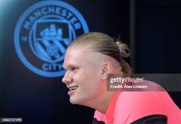 Erling Haaland of Manchester City faces the media during a press conference at Manchester City Football Academy on March 05, 2024 in Manchester,...