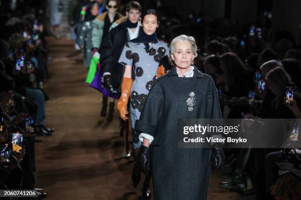 Kristin Scott Thomas walks the runway during the finale of the Miu Miu Womenswear Fall/Winter 2024-2025 show as part of Paris Fashion Week on March...