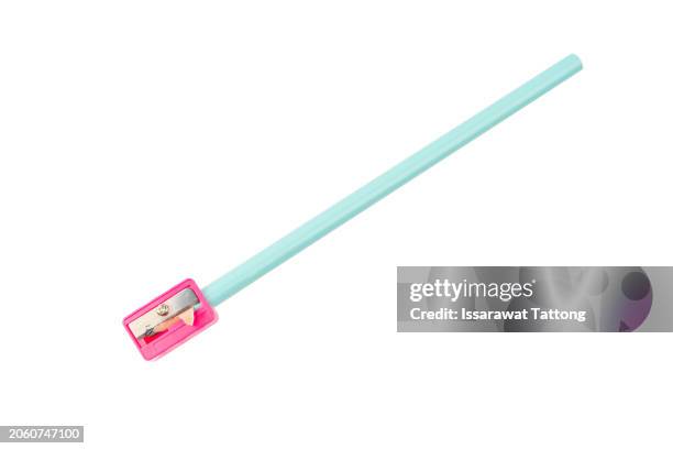 pencil and pencil sharpener isolated over white background - pencil sharpener stock pictures, royalty-free photos & images