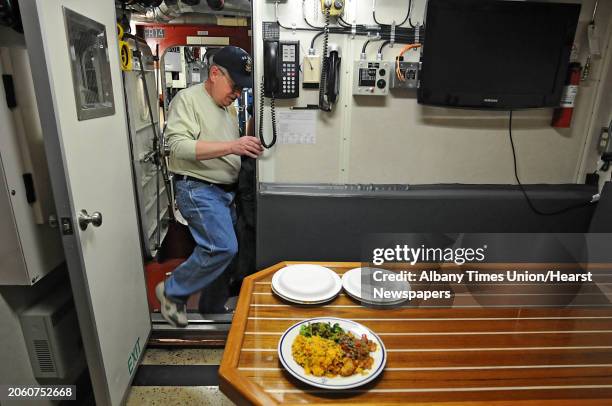 Hollis Stedman, of Altamont and employee of Albany Military Entrance Processing Station, takes a tour of the U.S. Coast Guard Cutter Sailfish at the...