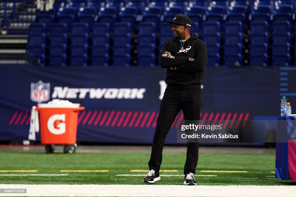 Joe Rice Nfl Jerry Rice smiles during the NFL Combine at the Lucas Oil Stadium on ...