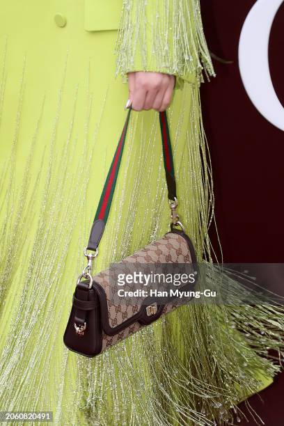 Model Irene Kim, bag detail, is seen at the GUCCI 2024 Women's S/S for 'Gucci Ancora' pop-up store opening photocall on March 05, 2024 in Seoul,...