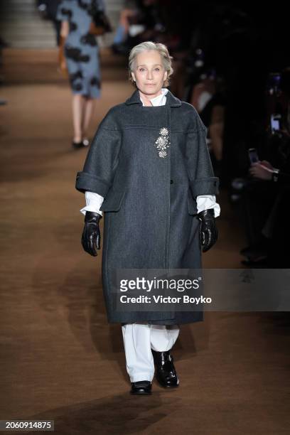 Kristin Scott Thomas walks the runway during the Miu Miu Womenswear Fall/Winter 2024-2025 show as part of Paris Fashion Week on March 05, 2024 in...