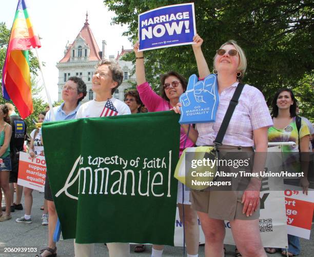 Kathy Moore, of Berne, left, Jean Burton, of Gallupville, Bien Baez, of Albany, and Judith Henningson, of Berne, right, represent Emmanuel Baptist...