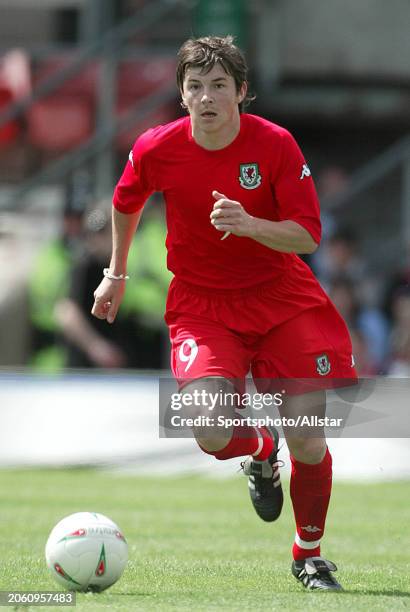 May 30: John Oster of Wales on the ball during the International Friendly match between Wales and Canada at Racecourse Ground on May 30, 2004 in...