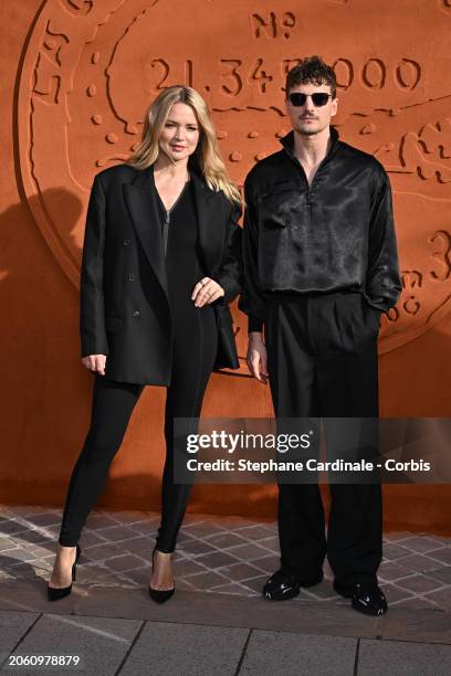 Virginie Efira and Niels Schneider attend the Lacoste Womenswear Fall/Winter 2024-2025 show as part of Paris Fashion Week on March 05, 2024 in Paris,...