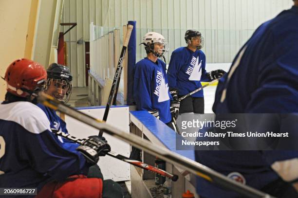 Men warm up before an adult men's hockey league game at Albany County Hockey Rink in Albany, N.Y. Wednesday, Oct. 5, 2011.
