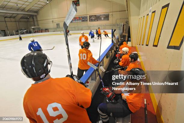 Men play in an adult men's hockey league game at Albany County Hockey Rink in Albany, N.Y. Wednesday, Oct. 5, 2011.