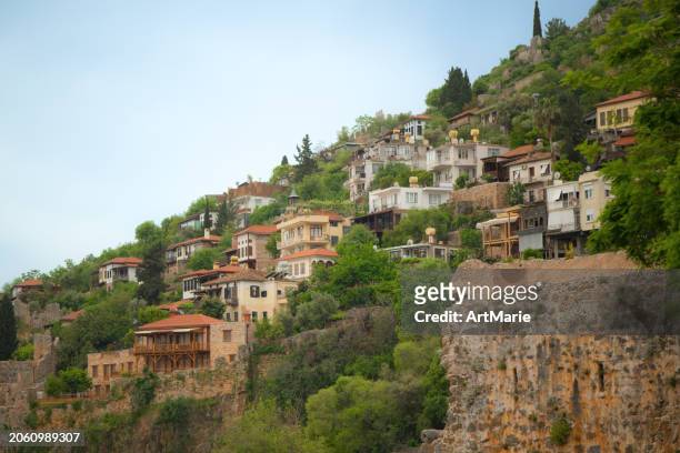 old town district of  alanya, turkey, with ancient castle and fortified wall - alanya castle stock pictures, royalty-free photos & images