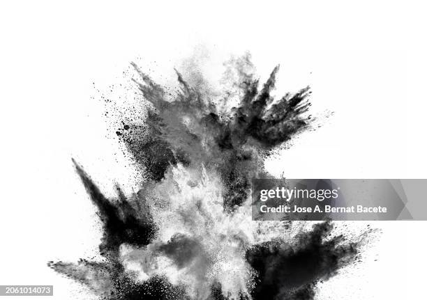 multiple explosions of dust and smoke in expansive motion on a white background. - detonator stock pictures, royalty-free photos & images