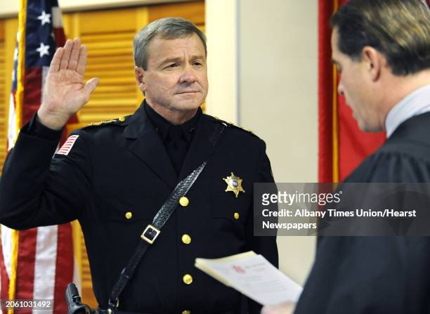Sheriff Jack Mahar is sworn in for a third term by Hon. Michael Melkonian on Monday, Jan. 2, 2012 at the Rensselaer County Jail in Troy, N.Y.