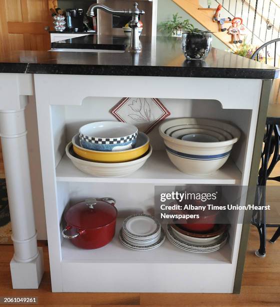 Liz Argotsinger's end shelving in her kitchen island on Tuesday, Feb. 7, 2012 in Gloversville, N.Y.