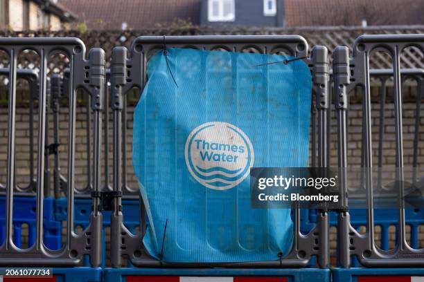 Thames Water Ltd. Company logo on protective barriers in London, UK, on Wednesday, March 6, 2024. Thames Water is waiting for a verdict on whether it...