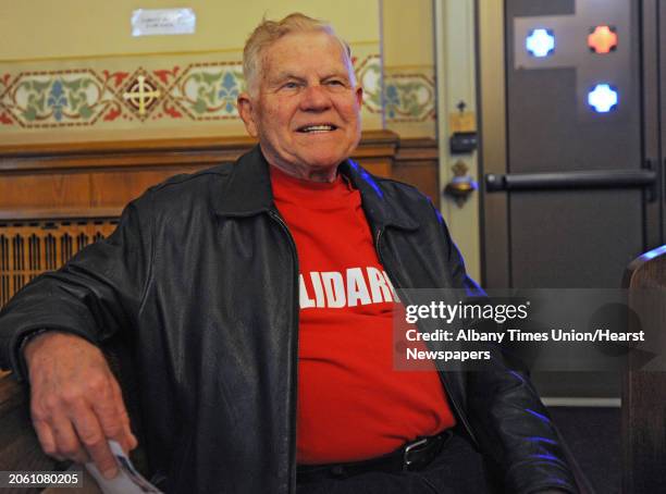 Parishioner Hank Tomkowicz sits in a pew at St. Stanislaus Kostka Church Friday March 30, 2012 in Adams, Mass. The church re-opened after a...