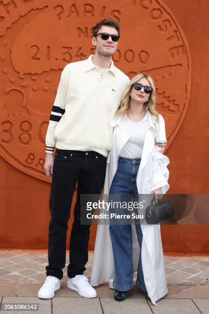 Cody John and Emma Roberts attends the Lacoste Womenswear Fall/Winter 2024-2025 show as part of Paris Fashion Week on March 05, 2024 in Paris, France.