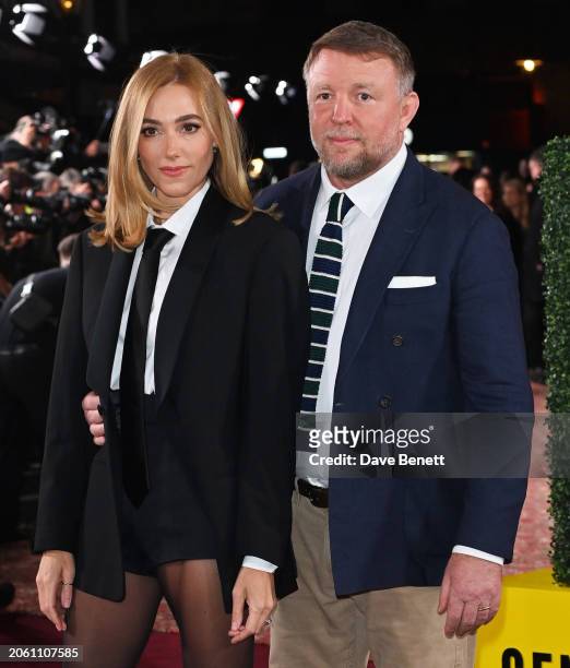 Jacqui Ainsley and Guy Ritchie attend the UK Series Global Premiere of new Netflix series "The Gentlemen" at the Theatre Royal Drury Lane on March...