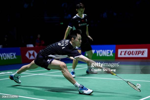 Liu Yuchen and Ou Xuanyi of China compete in the Men's Doubles First Round match against Chang Ko-Chi and Po Li-Wei of Chinese Taipei during day one...