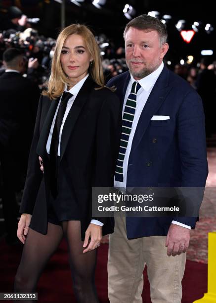 Jacqui Ainsley and Guy Ritchie attend the UK Series Global Premiere of "The Gentlemen" at the Theatre Royal Drury Lane on March 05, 2024 in London,...