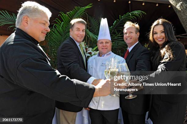 From left, Rick Treacy, executive chef and owner of Michael's Banquet House, Scott Spiro, investor, board member and VP of technology, Dale Miller,...