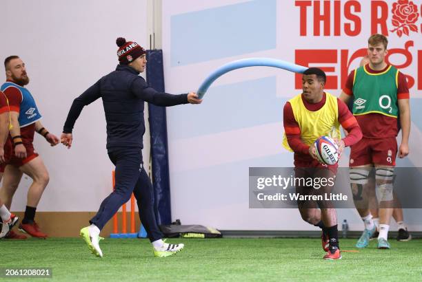 Immanuel Feyi-Waboso takes part in an indoor training session at the Honda England Rugby Performance centre at Pennyhill Park on March 04, 2024 in...