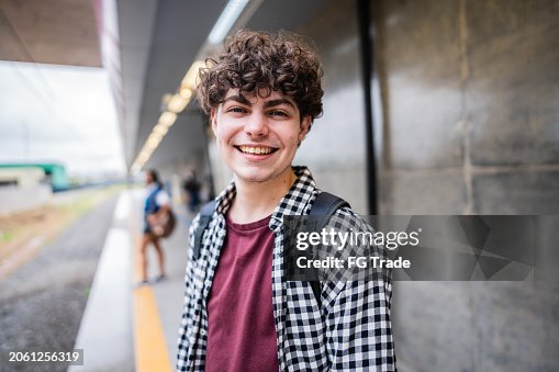 Portrait of young transgender male at subway platform Portrait of young transgender male at subway platform