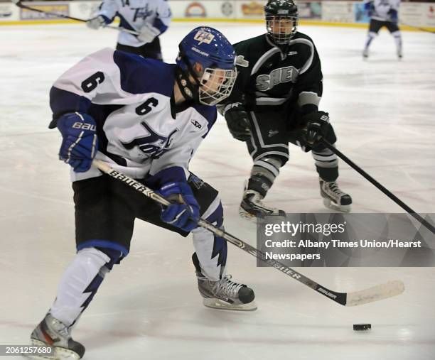 Saratoga's Matt Flynn looks for an assist during the section II division I hockey championship game against Shenendehowa at Union College on Thursday...