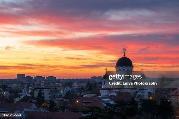 beautiful sunset over casin church - bucharest, romania - bucharest stock pictures, royalty-free photos & images