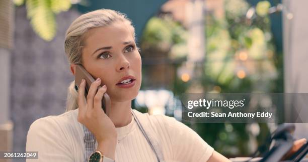 cafe, phone call and worried woman with stress, fear or disaster, risk or news. restaurant, fail and concerned waitress with smartphone conversation, anxiety or 404, glitch or frustrated by phishing - overworked waitress stock pictures, royalty-free photos & images