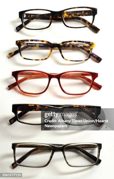 Warby Parker eye glasses on Tuesday, March 19, 2013 in Colonie, N.Y. From top to bottom, Fitz, Linwood, Marshall, Thompson and Reynold.