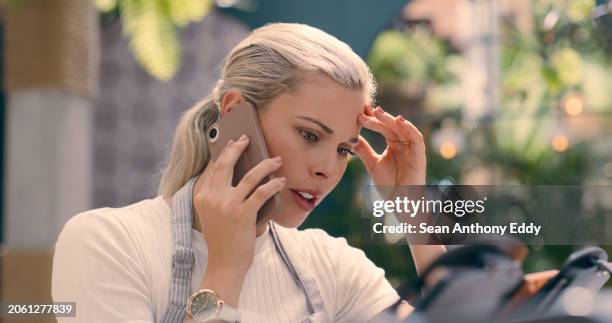 restaurant, phone call and worried woman with stress, fear or disaster, risk or news. cafe, fail and concerned waitress with smartphone conversation, anxiety or 404, glitch or frustrated by phishing - overworked waitress stock pictures, royalty-free photos & images