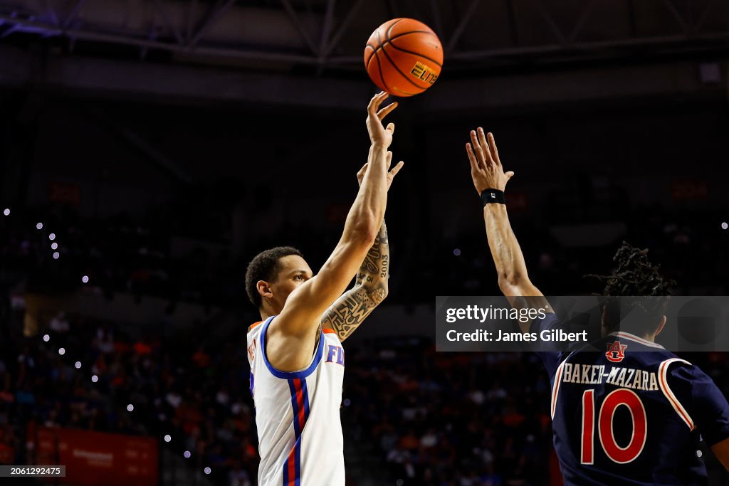 Florida Versus Riley Riley Kugel of the Florida Gators shoots the ball against Chad... News ...