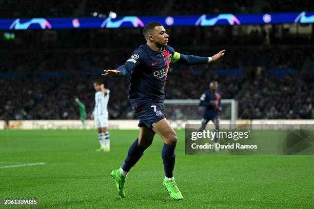 Kylian Mbappe of Paris Saint-Germain celebrates scoring his team's first goal during the UEFA Champions League 2023/24 round of 16 second leg match...