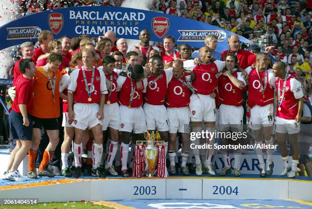 May 15: Arsenal players celebrate with Premiership trophy after becoming the 2003-2004 Premier League champions after winning the Premier League...