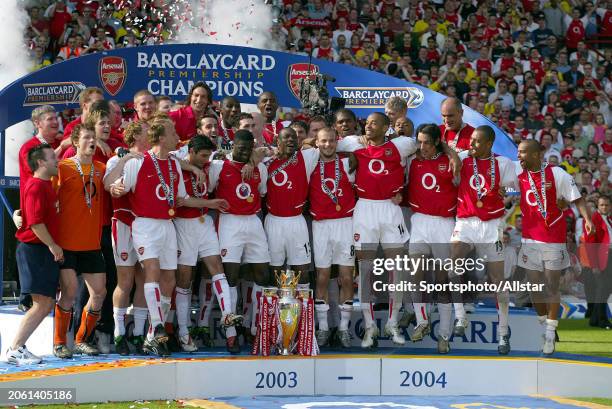 May 15: Arsenal players celebrate with Premiership trophy after becoming the 2003-2004 Premier League champions after winning the Premier League...