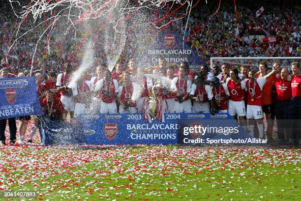 May 15: Arsenal players celebrate with Premiership trophy after becoming the 2003-2004 Premier League champions after winning the Premier League...