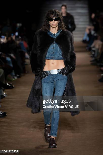 Mica Arganaraz walks the runway during the Miu Miu Ready to Wear Fall/Winter 2024-2025 fashion show as part of the Paris Fashion Week on March 5,...