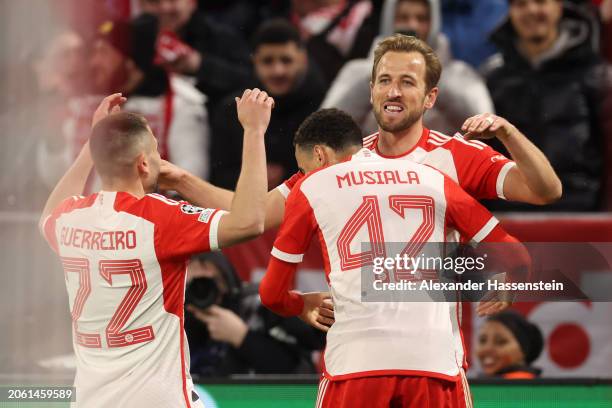 Harry Kane of Bayern Munich celebrates scoring his team's third goal with teammates Raphael Guerreiro and Jamal Musiala during the UEFA Champions...