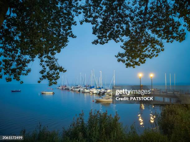 yachts moored in the marina at dusk - pomorskie province stock pictures, royalty-free photos & images
