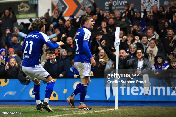 Leif Davis of Ipswich Town celebrates scoring his team's third goal with team mate Jeremy Sarmiento during the Sky Bet Championship match between...